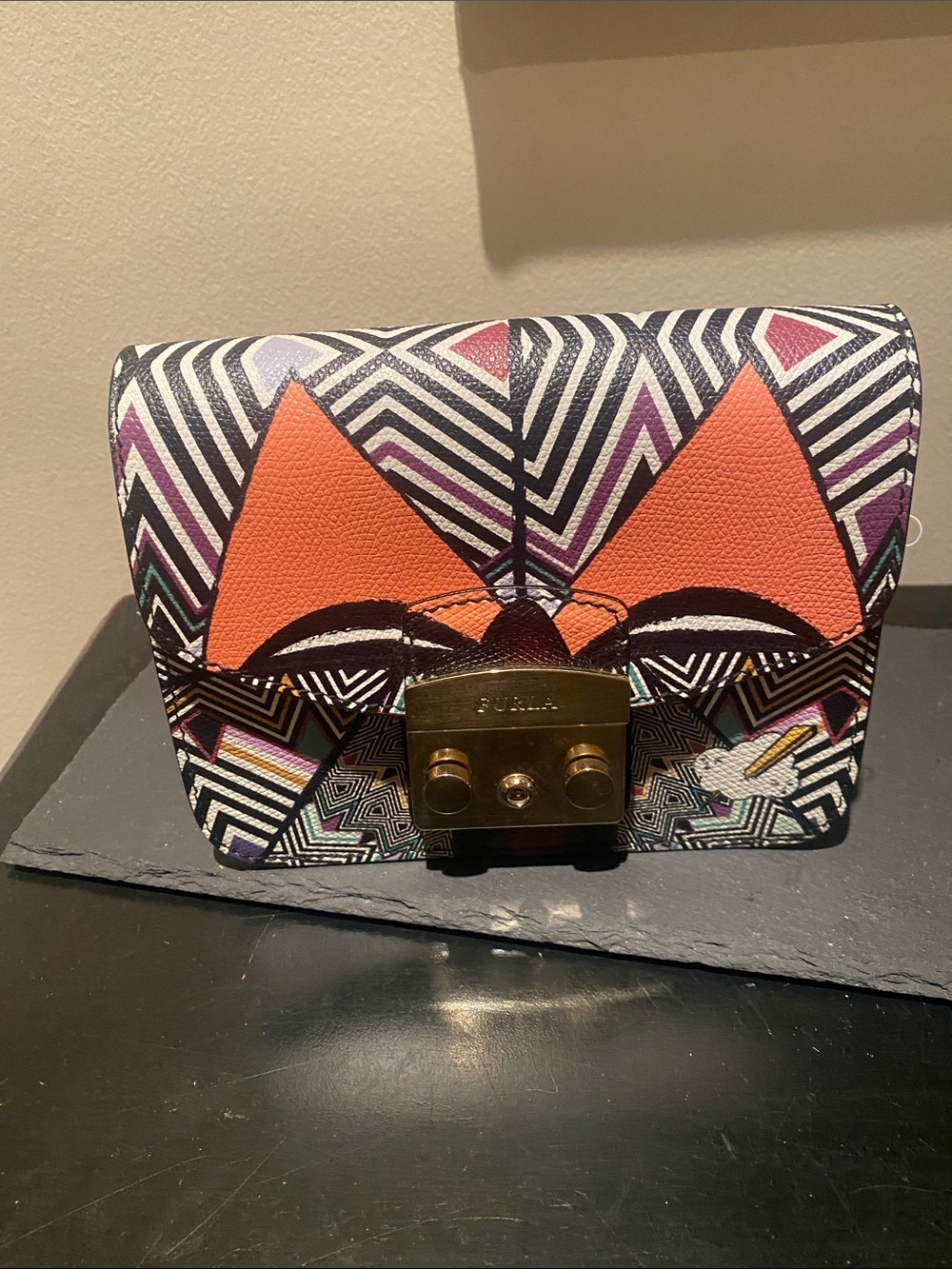 Furla Mini Crossbody with Bold Orange Accent and Geometric Print